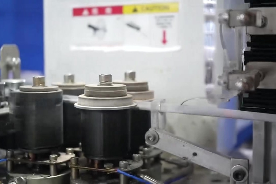 Close-up of straw production rollers